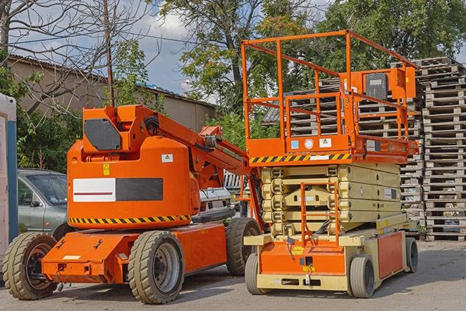 warehouse forklift maneuvering through aisles of merchandise in Beaver Dam